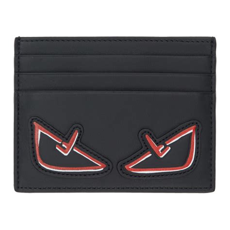 fendi black bag bugs card holde|Fendi bifold card holder.